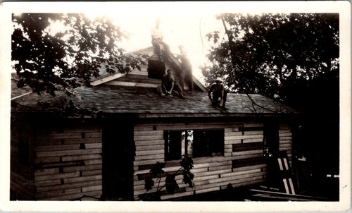 Men building wooden cabin - men, roof